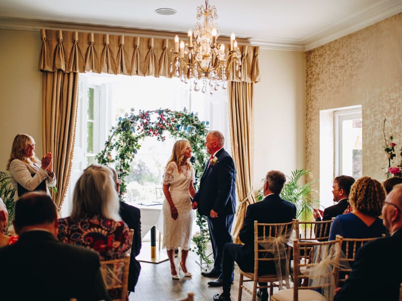 Mature couple getting married with an indoor ceremony