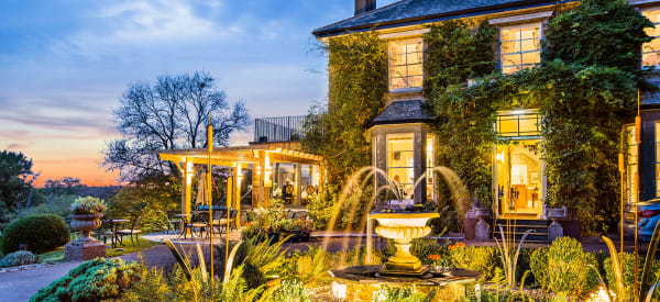 autumn fountain and house