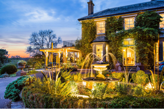 autumn fountain and house